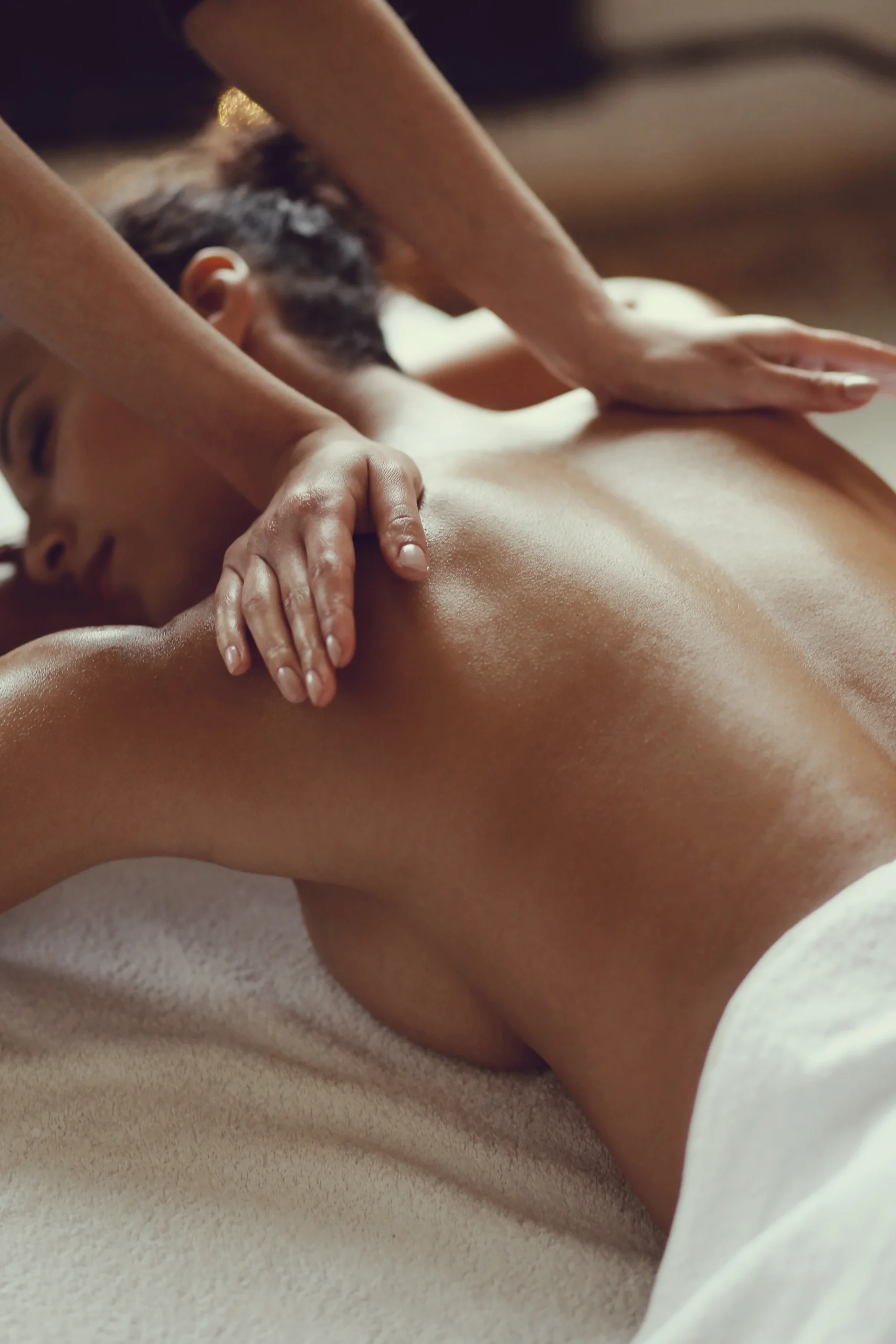 african-american-woman-receiving-relaxing-massage-spa